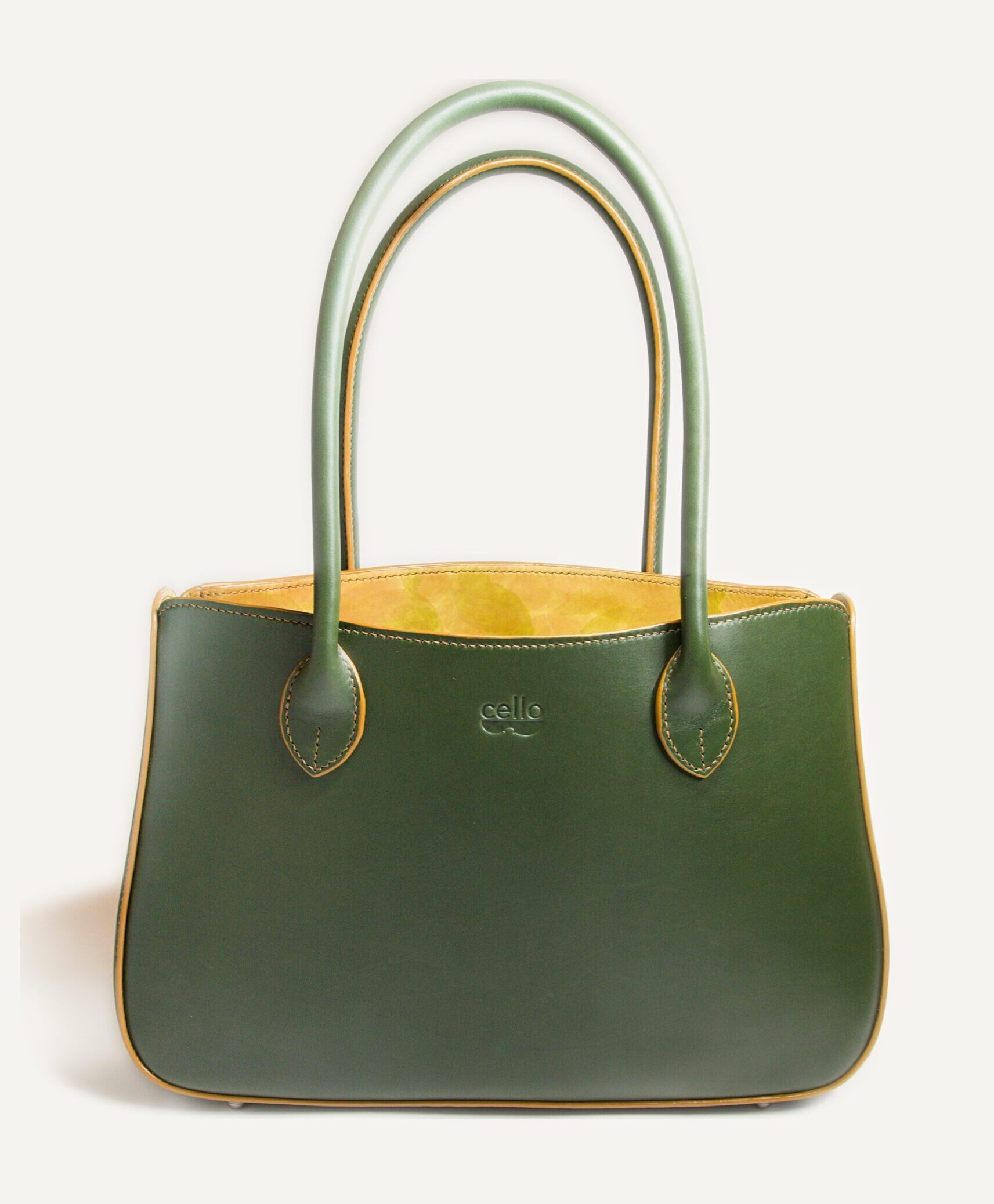 The Alto when new: bright forest-green leather, crisp edges, a clearly stamped maker's mark